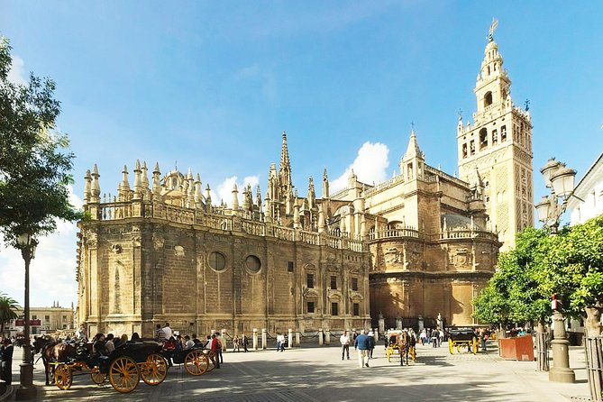 Bike tour through the monumental area of Seville - Catedral de Sevilla: exterior focus on doors, sculptures, and scale