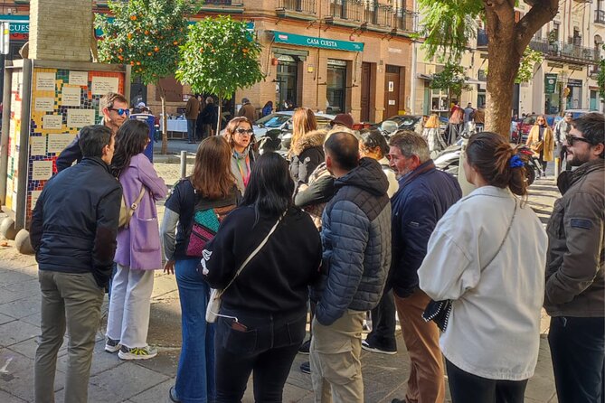 Complete Triana Tour "Corrales included". - Torre del Oro and the bridges: setting the stage before Triana