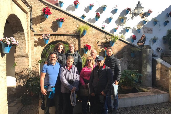 Cordoba & Carmona with Mezquita, Synagoge & Patios from Seville - Los Patios de San Basilio: Courtyards, Flowers, and Local Pride