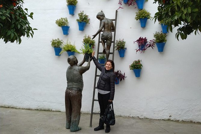 Cordoba City Tour with Mosque-Cathedral from Seville - Los Patios de San Basilio: flowers, courtyards, and neighborhood rhythm