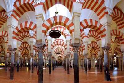 Cordoba Highlights: Guided Day Tour from Seville - Guided old-town walk: Roman walls first, history later