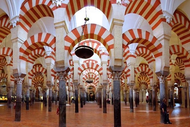 Cordoba Highlights: Guided Day Tour from Seville - Guided old-town walk: Roman walls first, history later