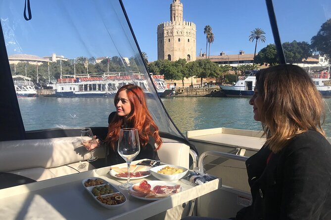 Exclusive Seville Boat Tour with Shared Tapas - Expo-Era Seville: The 1992 Universal Exhibition and the 1929 Ibero-American Buildings