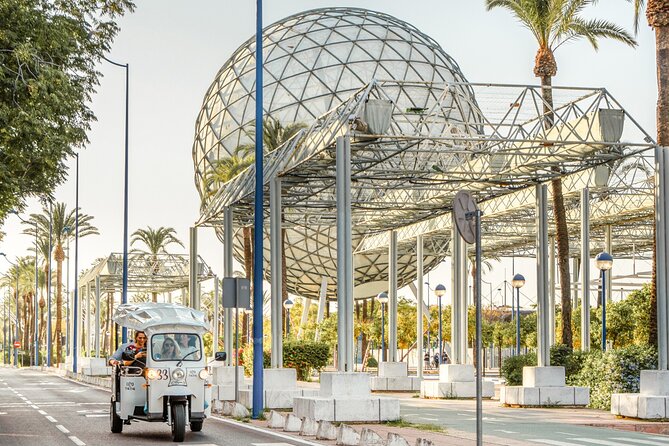 Expert Tour of Seville in Private Eco Tuk Tuk - Triana and the Triana Bridge: food streets and ceramic shops