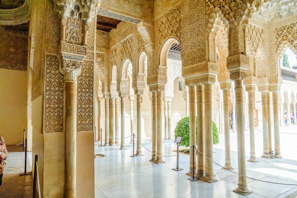 From Seville: Granada Day Trip Alhambra and Albaycin - Entering the Alhambra: Nasrid Palaces, Alcazaba, and Charles V Focus
