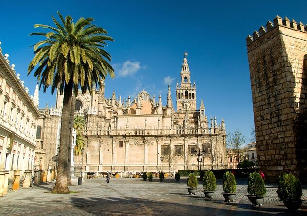 Guided Tour of Santa Cruz Jewish Quarter, Alcázar, and Cathedral - Plaza del Triunfo: the launchpad for Santa Cruz and the Cathedral/Alcázar day