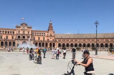 Highlights Electric Bike Tour - First sights on the route: Bullring, Golden Tower, and Cathedral/Giralda area