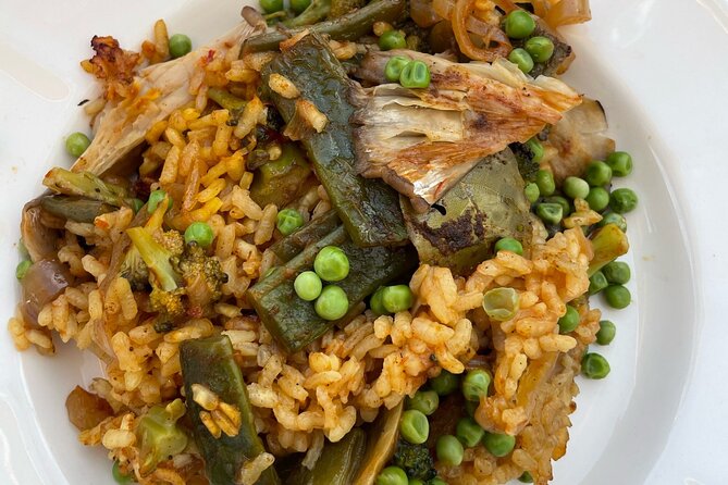Paella Dining Experience - Who should book this Seville rooftop paella evening?