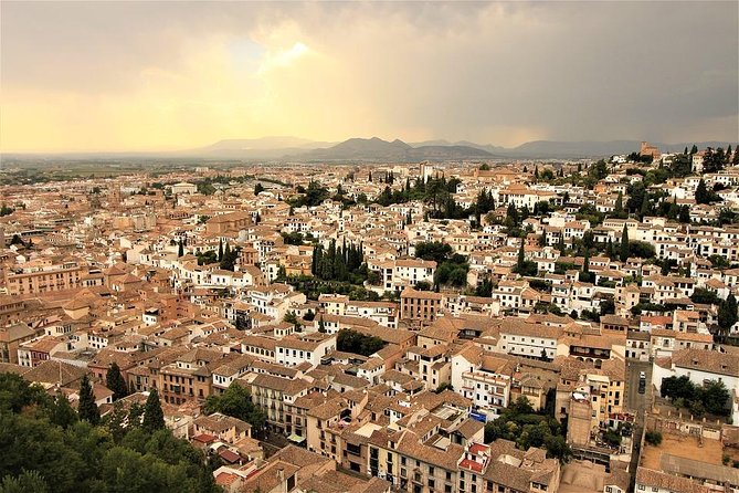 Private transfer from/to Seville to/from Granada with optional stop in Cordoba - Option 1 vs Option 2: choosing how much Cordoba you want