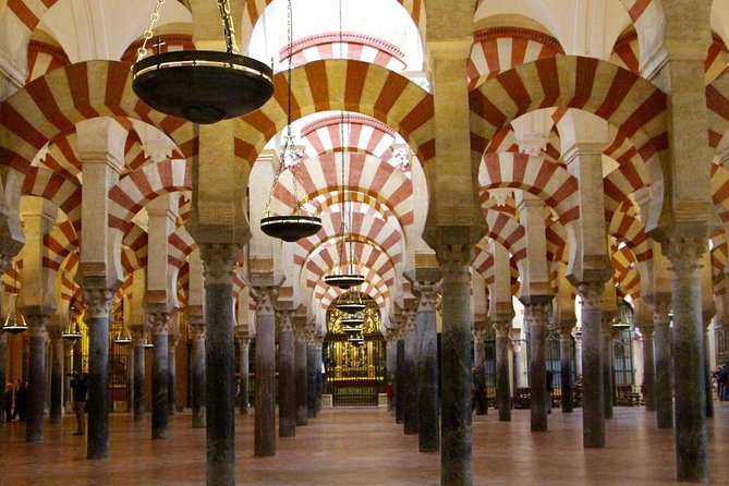 Private Transfer Seville to Granada with a Tour of Cordoba/Mosque - Jewish quarter lanes, patio peeks, and the alley of flowers