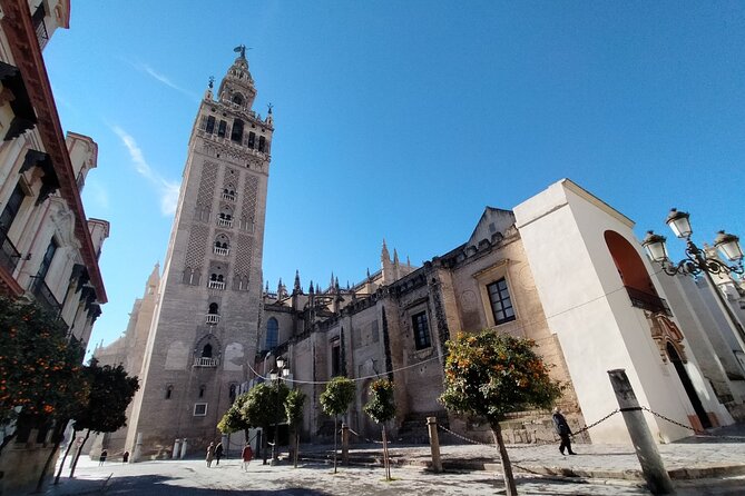 Private Walking Tour Alcazar and Cathedral in Sevilla - Real Alcázar: Islamic origins, palace splendor, and royal use today
