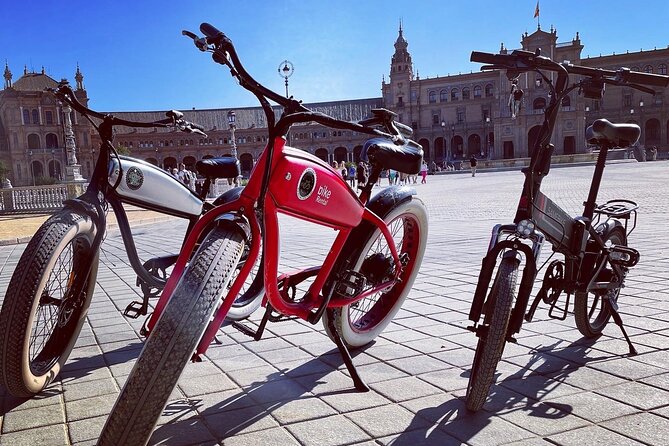 Ride Seville by E‐Bike – Small Group Local Experience - Parque de María Luisa and Plaza de España: quick beauty with a useful payoff