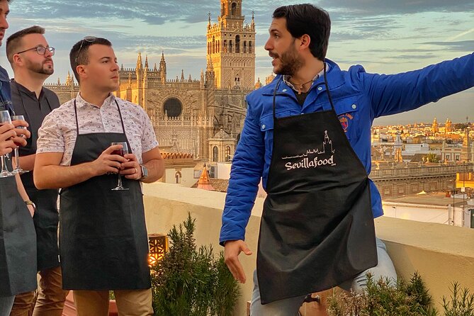 Sevilla: Rooftop Paella Cooking Class & 30-minute expert Q&A - Dinner with a view: paella, sangria, and the music factor