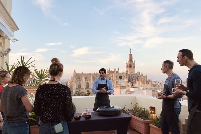 Sevilla: Rooftop Paella Cooking Class & 30-minute expert Q&A - Welcome drink, appetizers, and easy group bonding