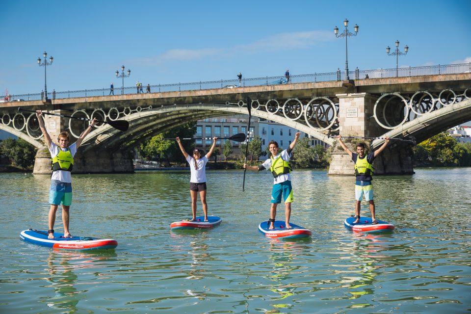 Seville: 1.5-Hour Daytime Standup Paddleboarding Tour - Puente de Isabel II: Your First Big Photo Moment