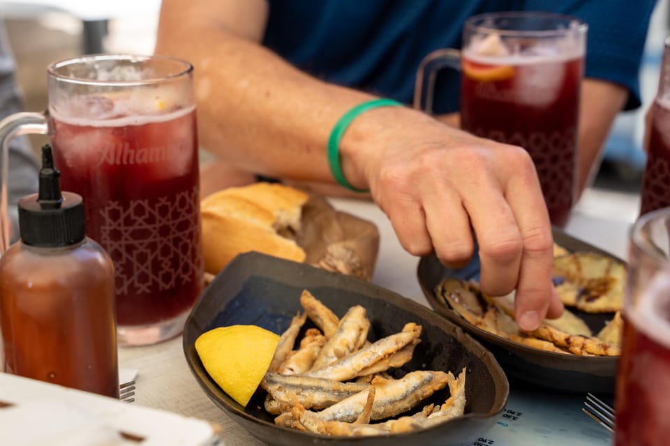 Seville Adventure: Historic Walking Tour & Traditional Tapas - San Telmo Palace, Torre del Oro: finishing the old-city loop with a sense of geography