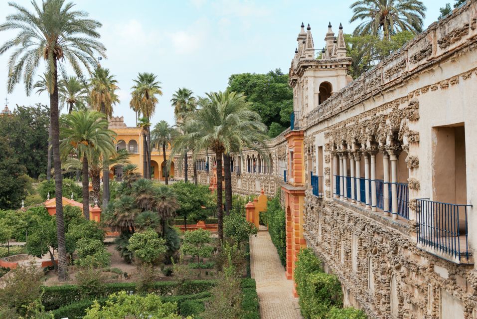 Seville: Alcázar, Cathedral & Giralda Fast Track Guided Tour - Seville Cathedral: UNESCO Scale, Patio Naranjos, and Columbus’s Tomb