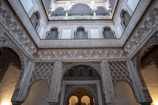 Seville Alcázar: Guided Premium Tour with Priority Entrance - Inside the Palace: Lion Gate, Justice Hall, Patio de la Morería, Pond of Mercury