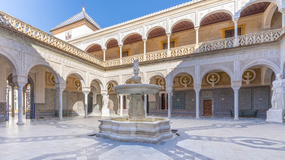 Seville: Casa de Pilatos Ground Floor Entry Ticket - Entering through the Renaissance-style marble gate