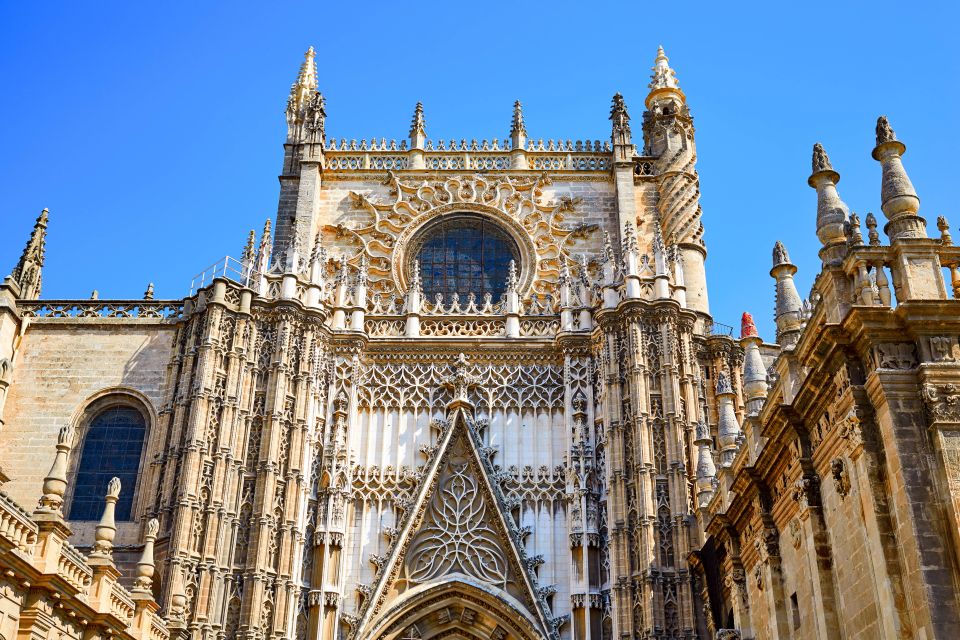 Seville: Cathedral and Alcázar Guided Tour - Seville Cathedral: Gothic Scale, Capilla Real, and the Giralda Views