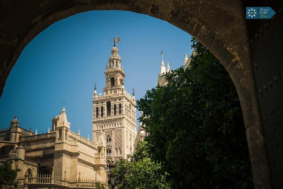 Seville: Cathedral, Giralda, and Royal Alcázar Guided Tour - Giralda Tower climb: ramps, history, and real city views