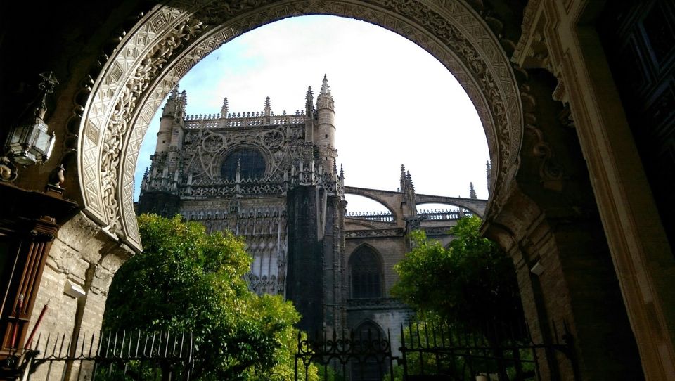 Seville: Cathedral & Giralda Fast-Track Guided Tour - Seville Cathedral Inside: Mosque Roots and UNESCO Wonder