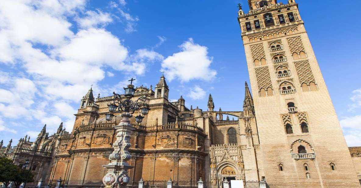 Seville: Cathedral & Giralda Guided Tour with Entry Tickets - Capilla Mayor and Columbus: where your camera starts working overtime