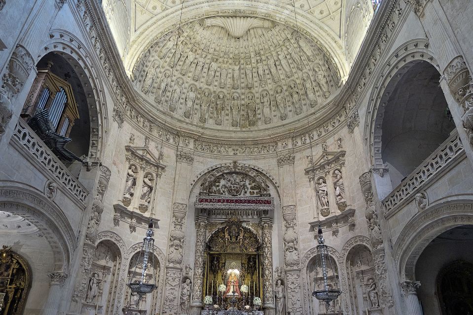 Seville: Cathedral & Giralda Guided Tour with Entry Tickets - Climbing the Giralda: slopes, 17 steps, and those city views