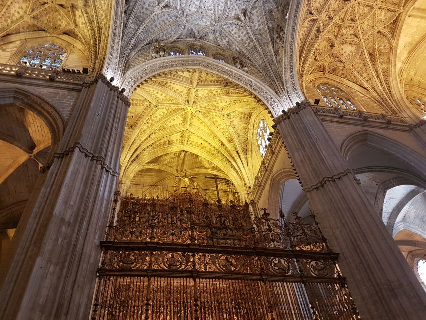 Seville Cathedral & Giralda Private Tour including tickets - Entering the cathedral: Gothic scale plus a guided path