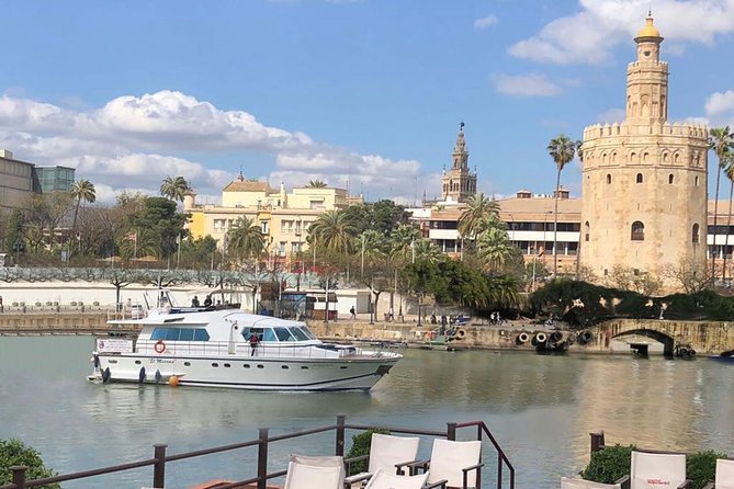 Seville: Cruise along the Guadalquivir River with appetizer - Boarding at Muelle Nueva York: Easy to Reach, Cobblestones Included
