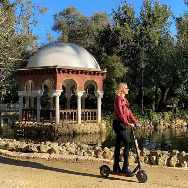 Seville: Electric Bike City Tour - Seville’s center monuments: Antigua Fábrica de Tabacos and the Alcázar