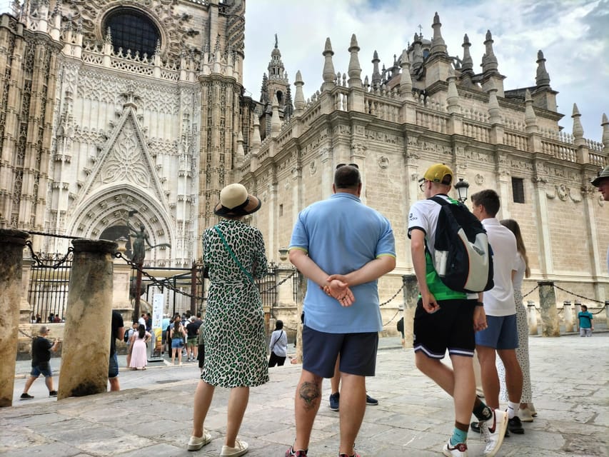 Seville: Fast Track Cathedral Giralda Tower Last minute Tour - Finding your guide at Puerta de San Cristóbal