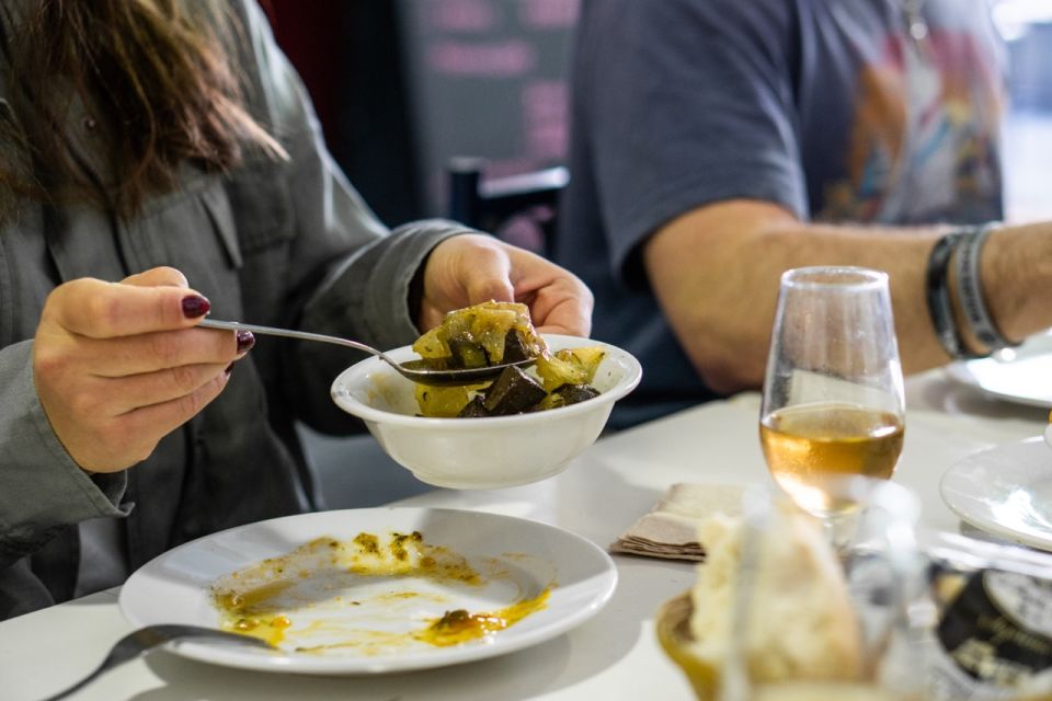 Seville: Flavors of Andalucía Guided Food Tour with Tastings - What you actually eat: tapas, wine, sherry, and the ugly-but-good rule