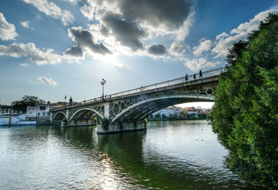 Seville: Guadalquivir & Secrets of Triana Small Group Tour - From Torre del Oro to Exploraterra: Ships, Discovery, and a Strong Starting Beat