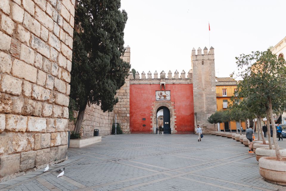 Seville: Guided Walking Tour with Alcazar & Cathedral Access - Santa Cruz streets: where the stories make the maze make sense