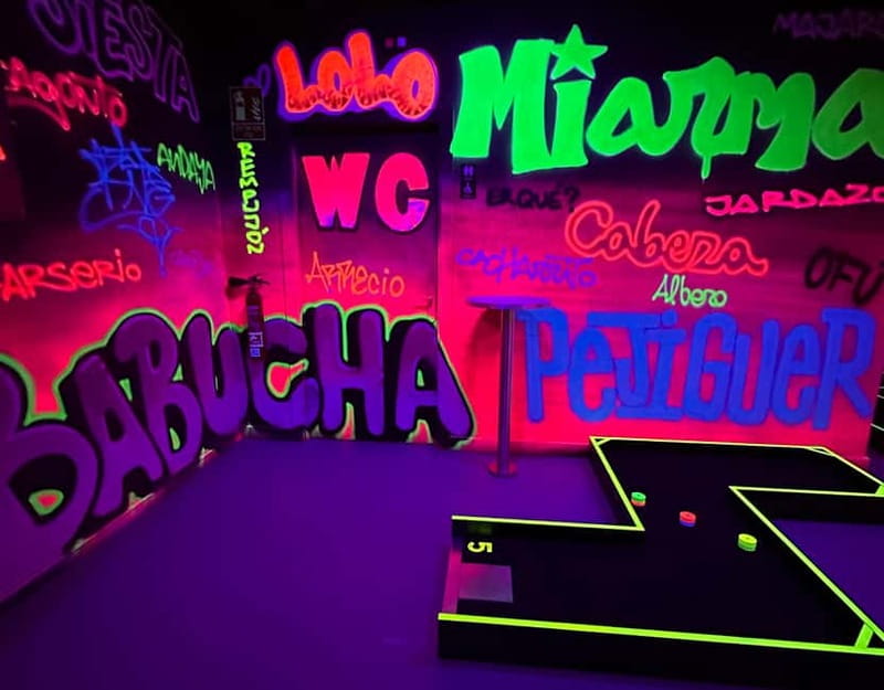 Seville: Indoor UV 18 hole Minigolf Experience - Staff help: when coaching is useful (and when it’s not)