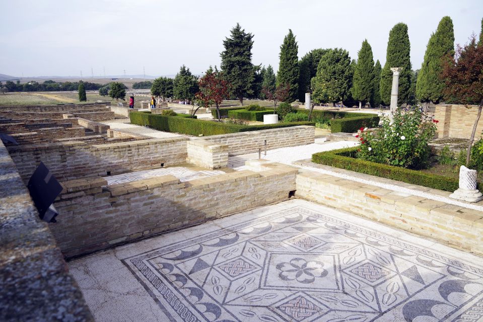 Seville: Italica Roman Ruins City Tour - Group size, language mix, and why timing can slip