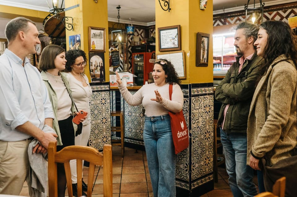 Seville: Private Tapas & History Tour in Triana Neighborhood - What you really get: 8+ tapas, 4 drinks, and a meal’s worth of food