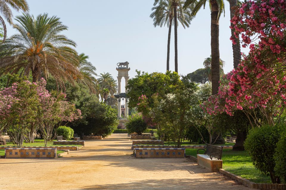 Seville: Relaxing City Bike Tour with a Tour Guide - Entering Seville’s heart on bike lanes and cobblestones