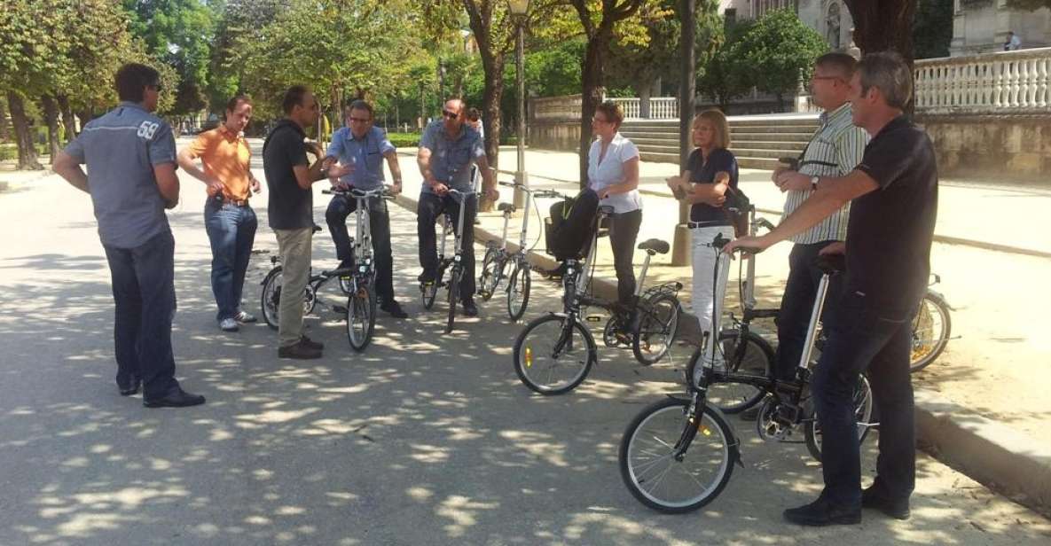 Seville: Relaxing Electric Bike tour with Tour Guide - Barrio Santa Cruz: The Old-Town Maze Without the Gridlock