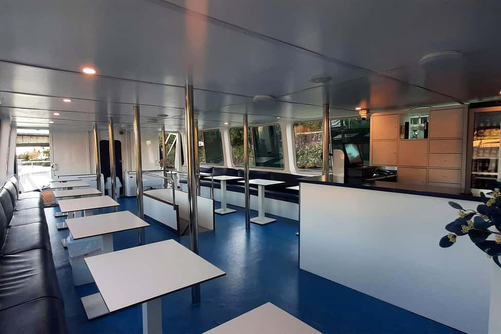 Seville: Restaurant boat ride on the Guadalquivir River with lunch/dinner - Where it starts: Muelle Nueva York and finding your boat