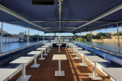 Seville: Restaurant boat ride on the Guadalquivir River with lunch/dinner - The boat experience: El Miarma Dos comfort and real conveniences