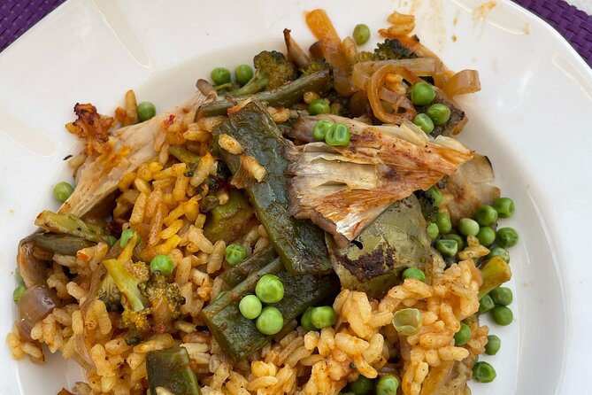 Seville: Rooftop Paella Showcooking and Sangría - Meeting on P.º de las Delicias and Finding the Right Vibe