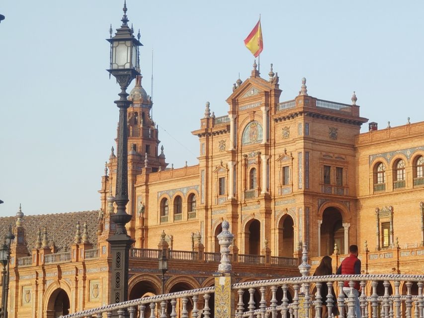 Seville: Small-Group City Highlights Walking Tour - Torre del Oro: a riverside landmark with a story