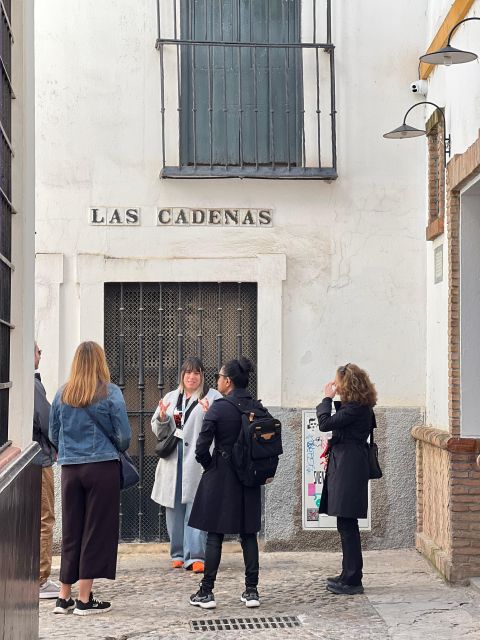 Seville: Small Group Jewish Quarter Tour with Tapas & Drinks - Tapas and drinks: 3 courses, Spanish wine, and a toast that lands