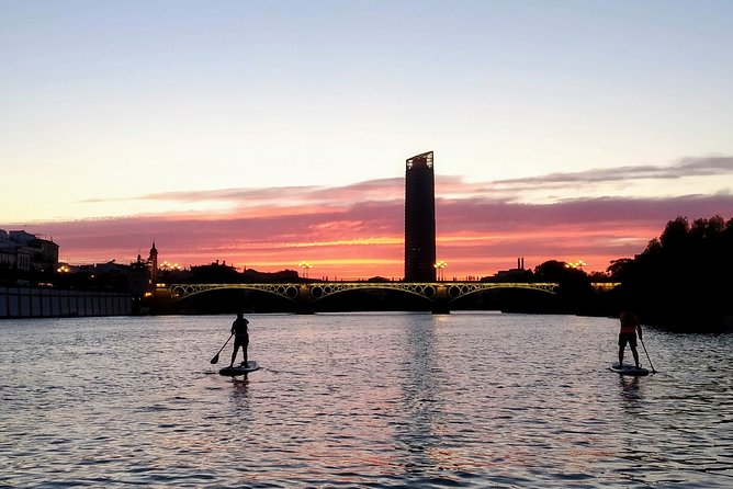 Seville: Sunset in Paddle Surf - What sunset paddle surf on Seville’s water feels like