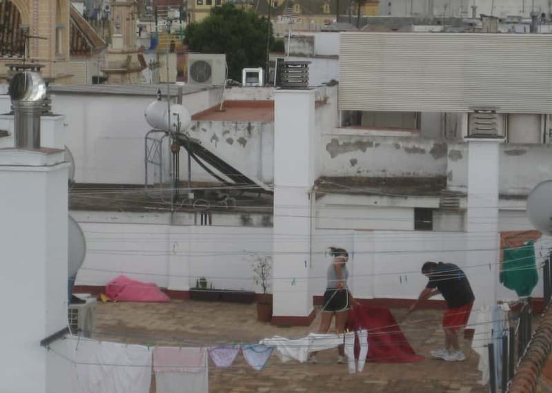 Seville: Sunset Roof Top Walking Tour - Santa Cruz for about 30 minutes: switch from skyline to street life
