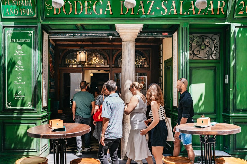 Seville: Tapas, Taverns and History Guided Walking Tour - Taberna Álvaro Peregil by the Cathedral: Orange Wine and Manchego Comfort