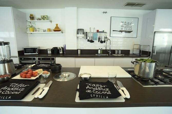 Spanish Cooking Class & Triana Market Tour in Sevilla - The meeting point reality: stalls 75–77 and the kitchen locations