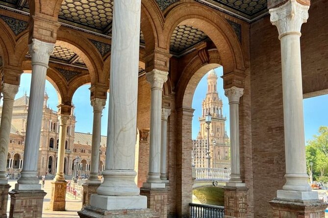 Spirit of Seville - Private Walking Tour with Casa de Pilato - Entering Casa de Pilatos: tiles and Greco-Roman statuary